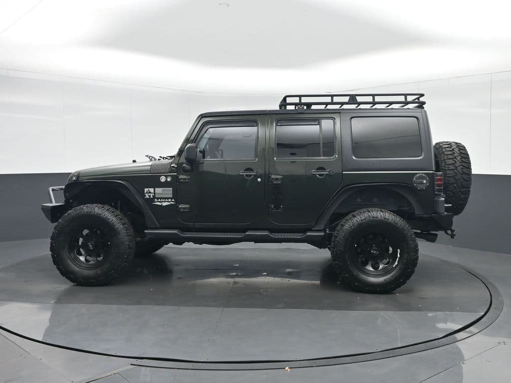 2012 Jeep Wrangler Unlimited Sahara, photo 4 of 44
