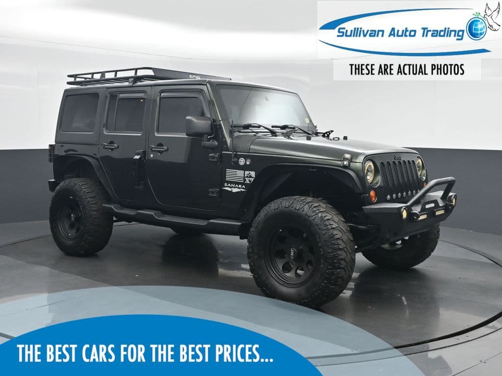 2012 Jeep Wrangler Unlimited Sahara, photo 1 of 44